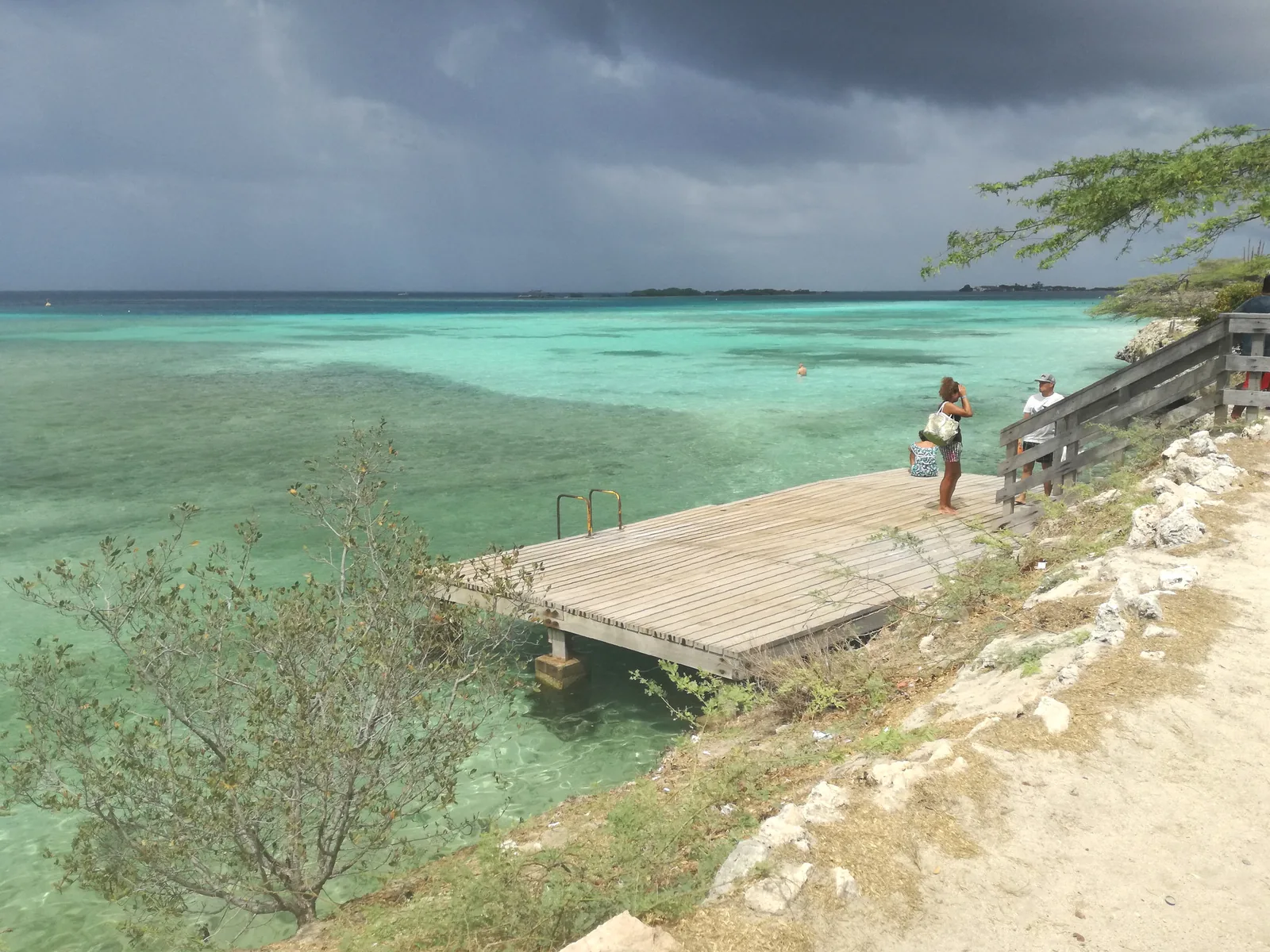 The swim deck over turquoise water at Mangel Halto beach in Pos Chiquito, Savaneta, Aruba