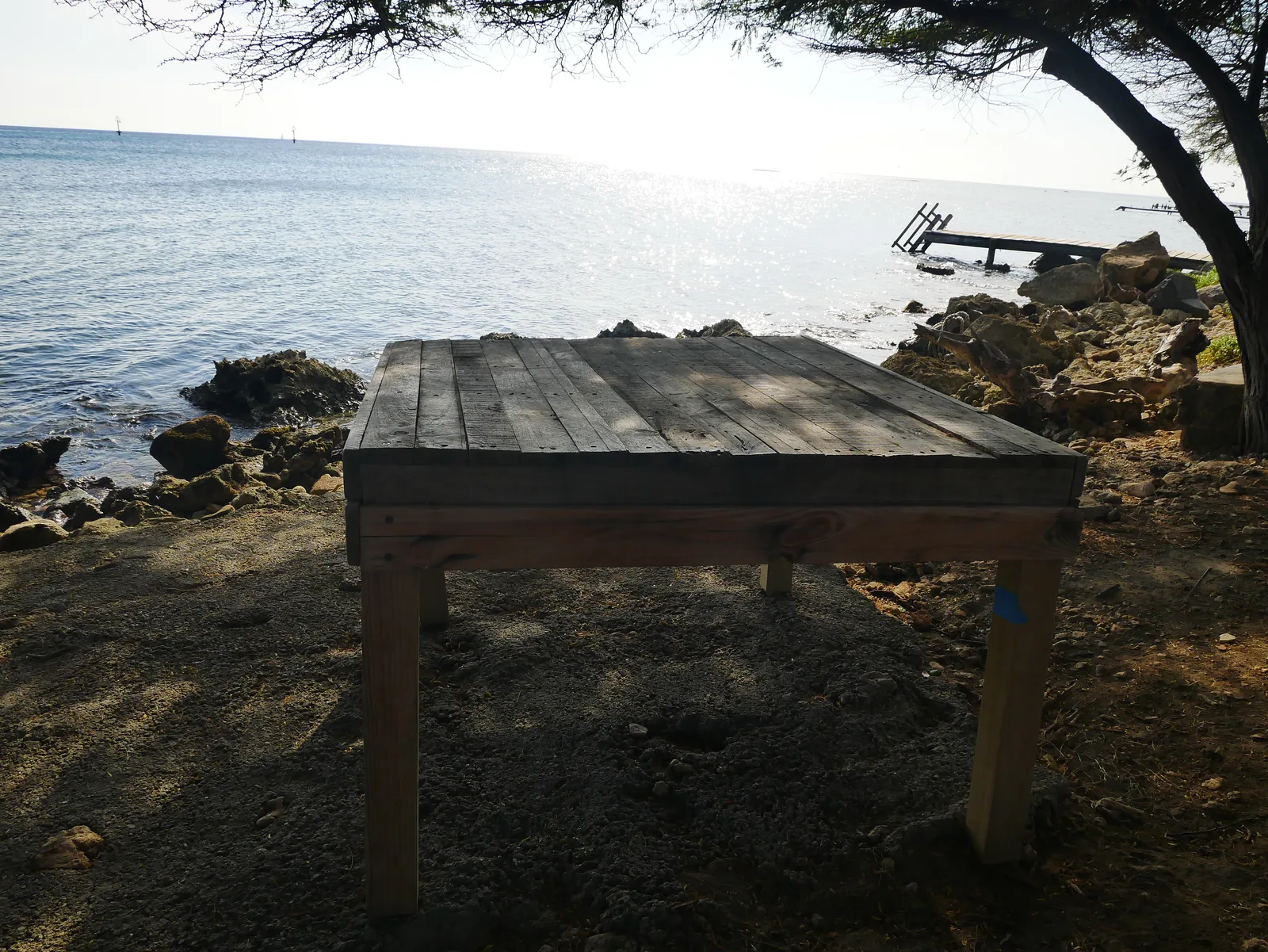 A wooden fish-cleaning table by the water in Savaneta, Aruba