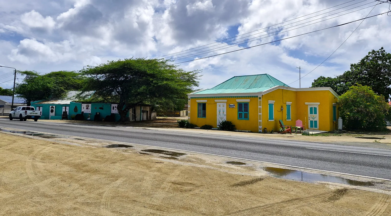 Colorful cunucu houses along the main road through Savaneta, Aruba